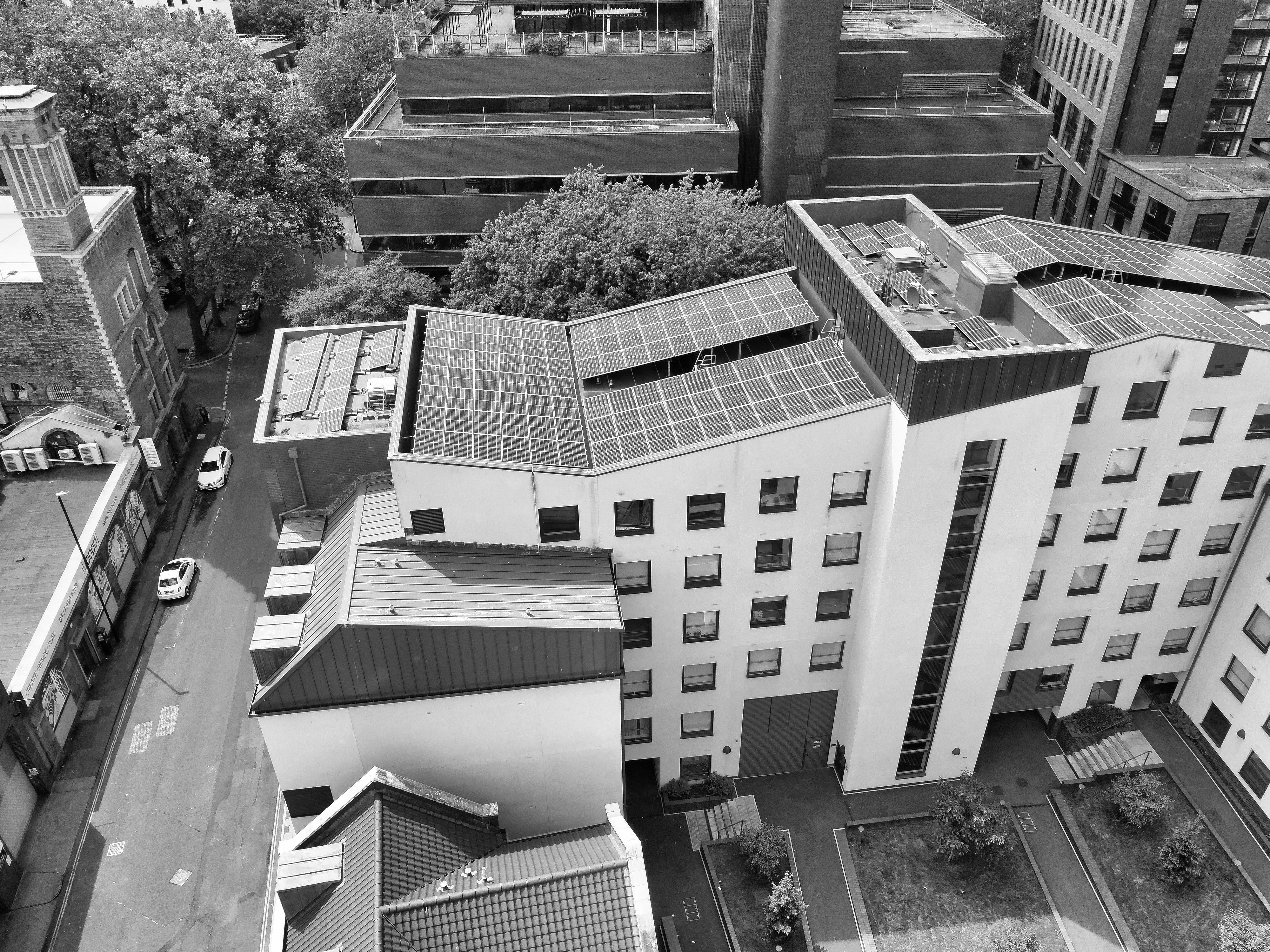 Aerial view of rooftop solar on a condo building